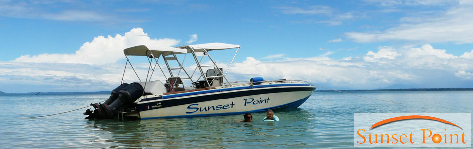 The Sunset Point boat wth a couple of visitors relaxing.
